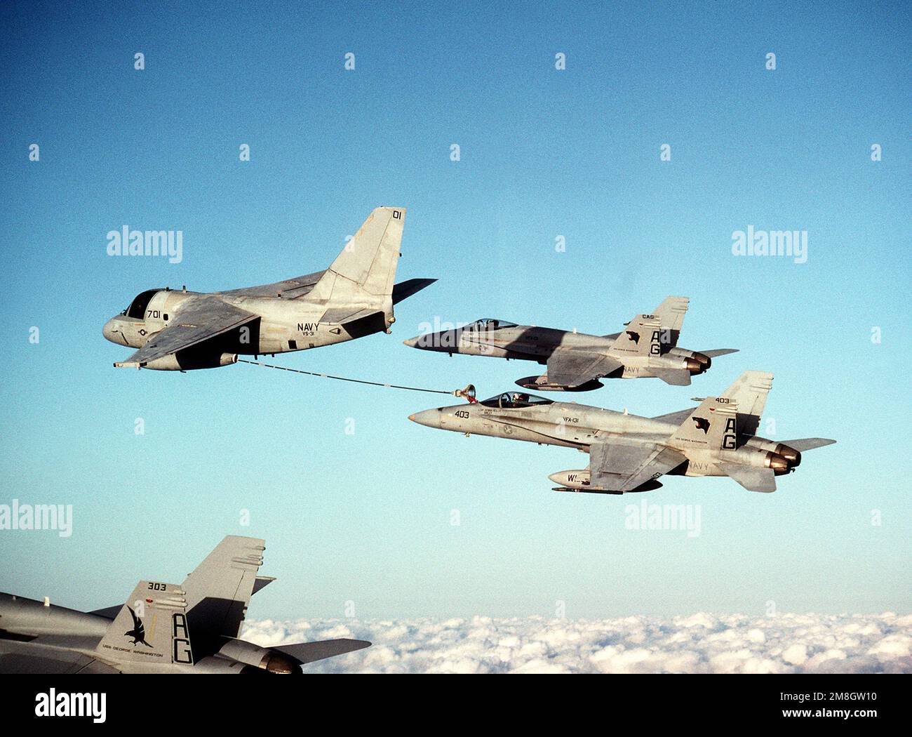 A Strike Fighter Squadron 131(VFA-131) F/A-18C Hornet aircraft receives ...