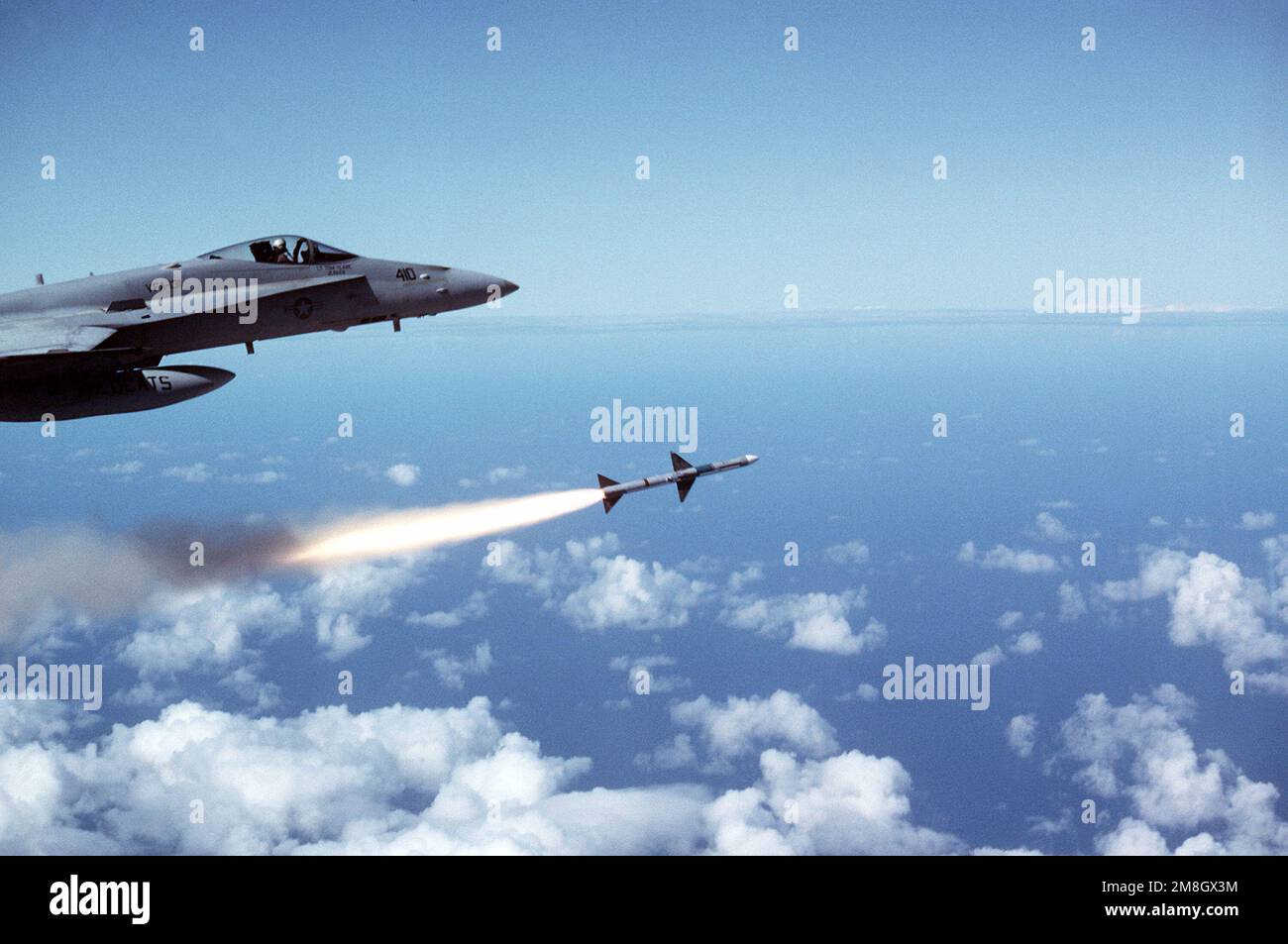 An AIM-7 Sparrow missile is launched from a Strike Fighter Squadron 131 ...