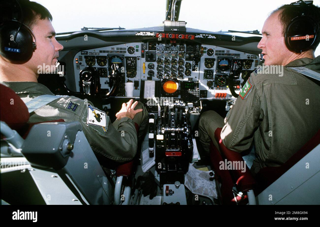 CAPT. Mike Boyington, pilot, and CAPT. Dave Fite, co-pilot, perform flight duties while preparing for a refueling mission in support of the operation. The flight crew and their KC-135 are from the 434th Air Refueling Wing, AFRES, Grissom AFB, Indiana. Subject Operation/Series: RESTORE HOPE Base: Moron Country: Spain (ESP) Stock Photo