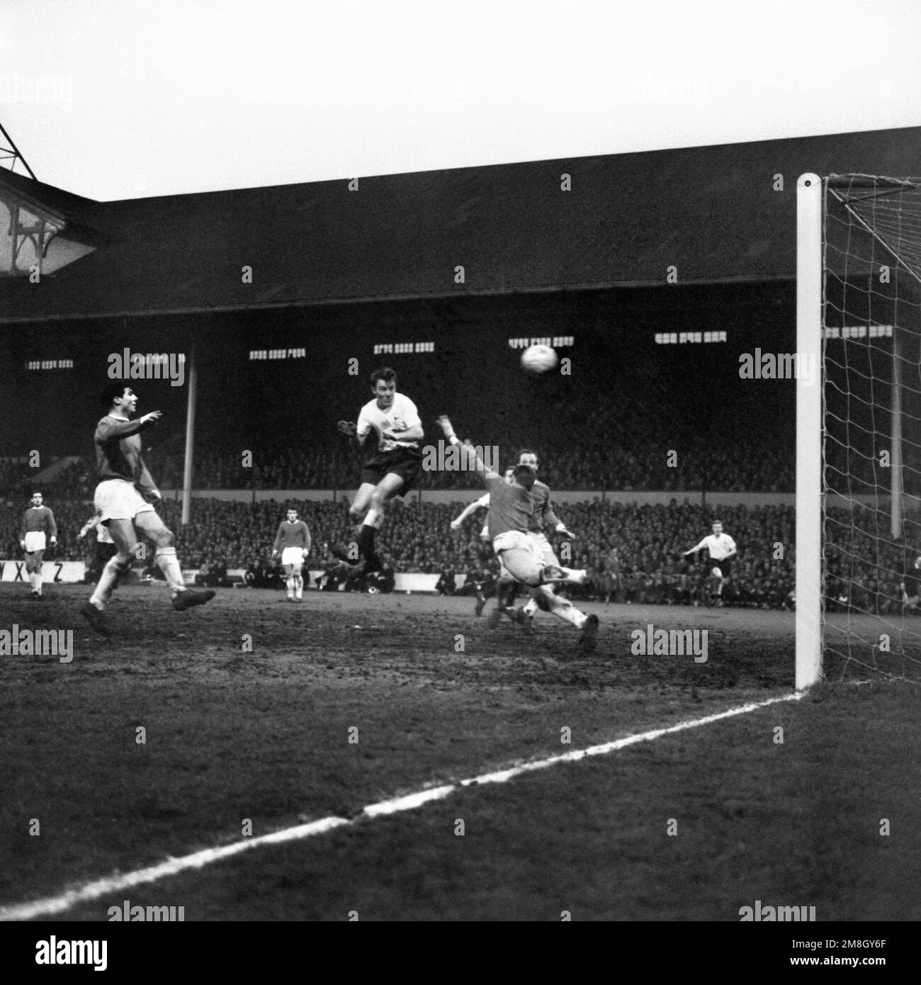 File photo dated 20-01-1962 of A header from Tottenham Hotspurs' Jimmy Greaves (centre) sends the ball soaring to the net. Harry Kane is within touching distance of becoming Tottenham’s all-time leading scorer but the late Jimmy Greaves will always have “the edge” over him and other great forwards, according to former team-mate Terry Dyson. Issue date: Saturday January 14, 2023. Stock Photo