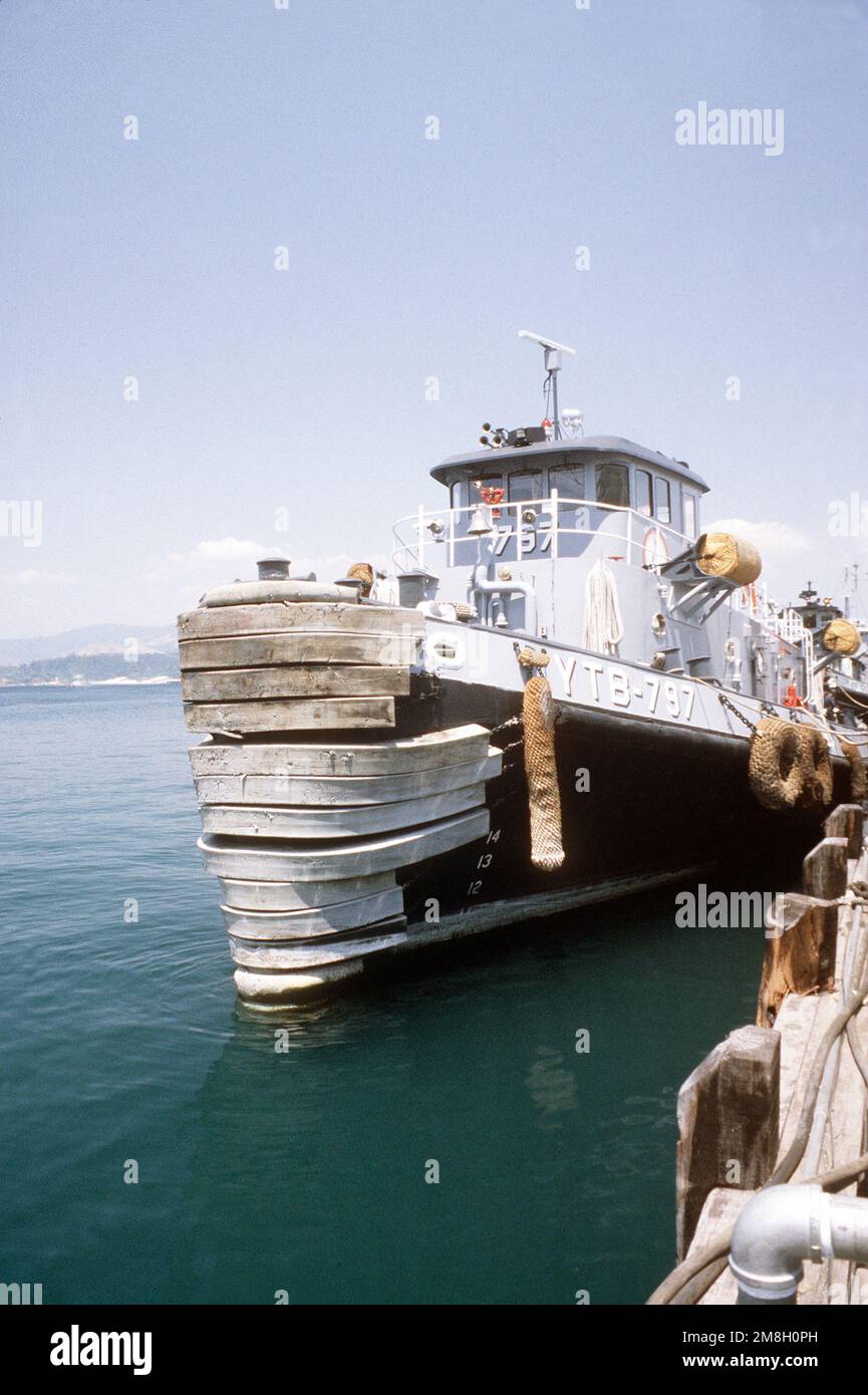 A port bow view of the large harbor tug TAMAQUA (YTB797) moored at the