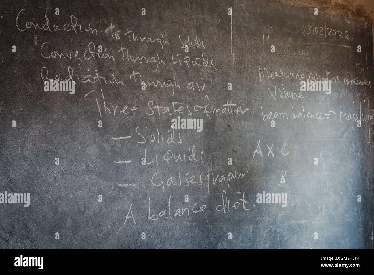 Chalkboard in rural school in Tanzania, Africa Stock Photo