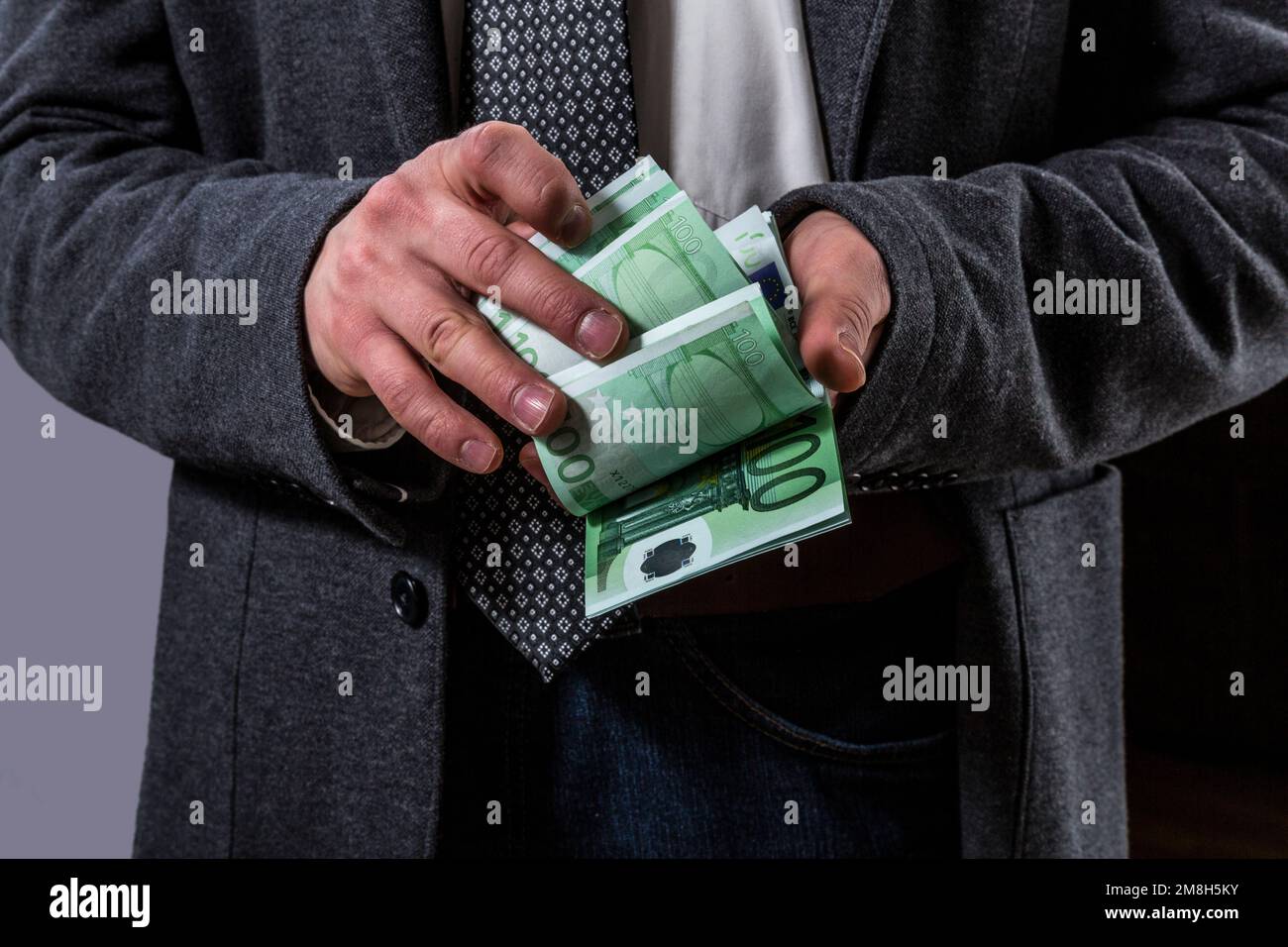 A Thousand Euros A Man Counting 100 Euro Banknotes Stock Photo Alamy a-thousand-euros-a-man-counting-100-euro-banknotes-stock-photo-alamy