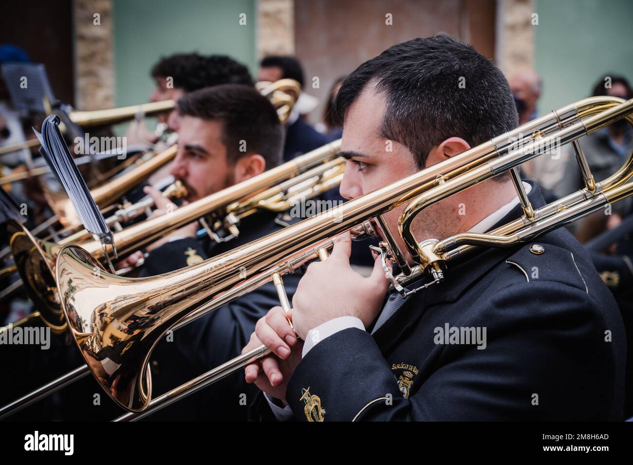 Musicians in an easter parade in a brass marching band at Semana santa or Holy week in Cadiz Spain. Stock Photo