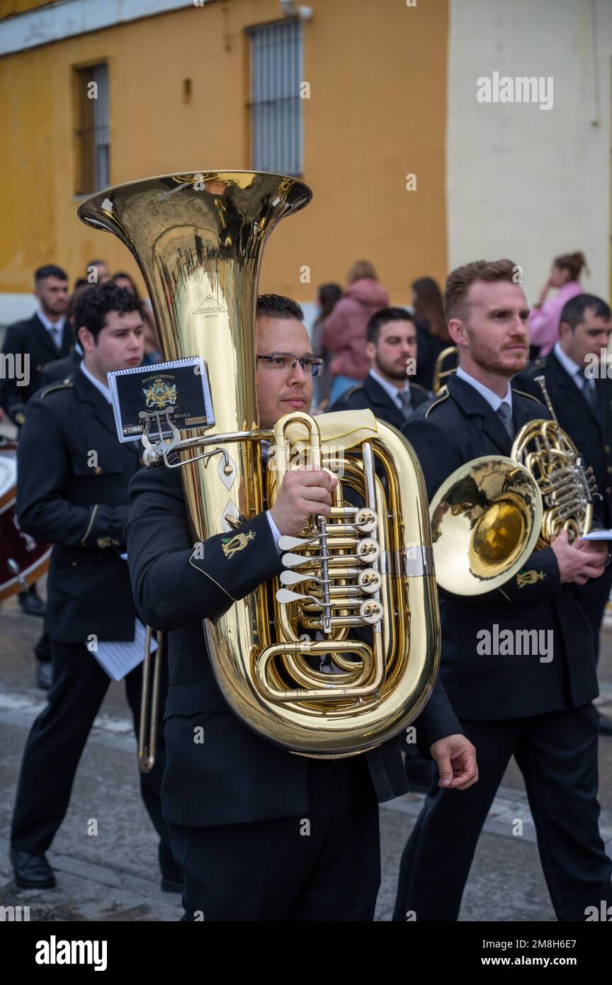 Musicians in an easter parade in a brass marching band at Semana santa or Holy week in Cadiz Spain. Stock Photo