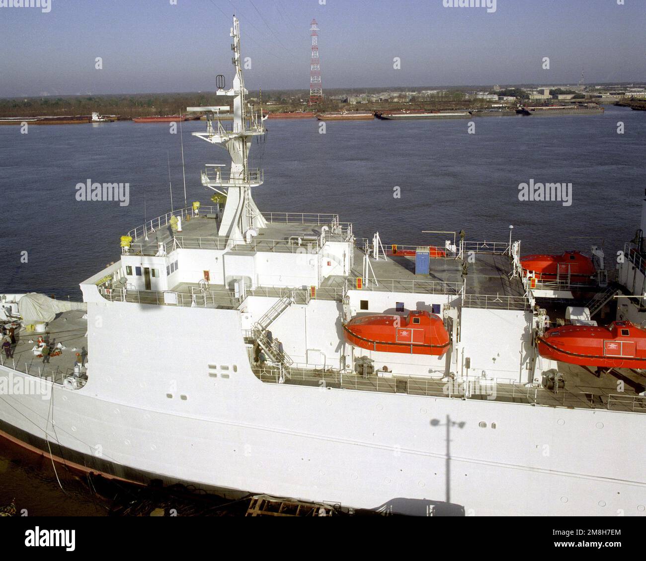 A port view of the surveying ship USNS WATERS (TAGS45) at the