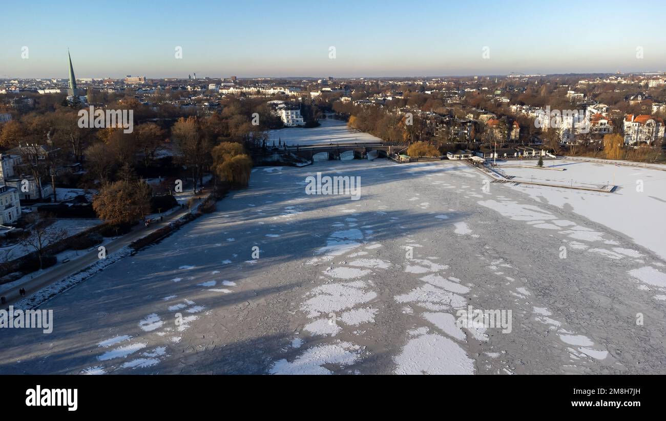 aerial view of the frozen outer alster lake with the krugkoppelbridge Stock Photo