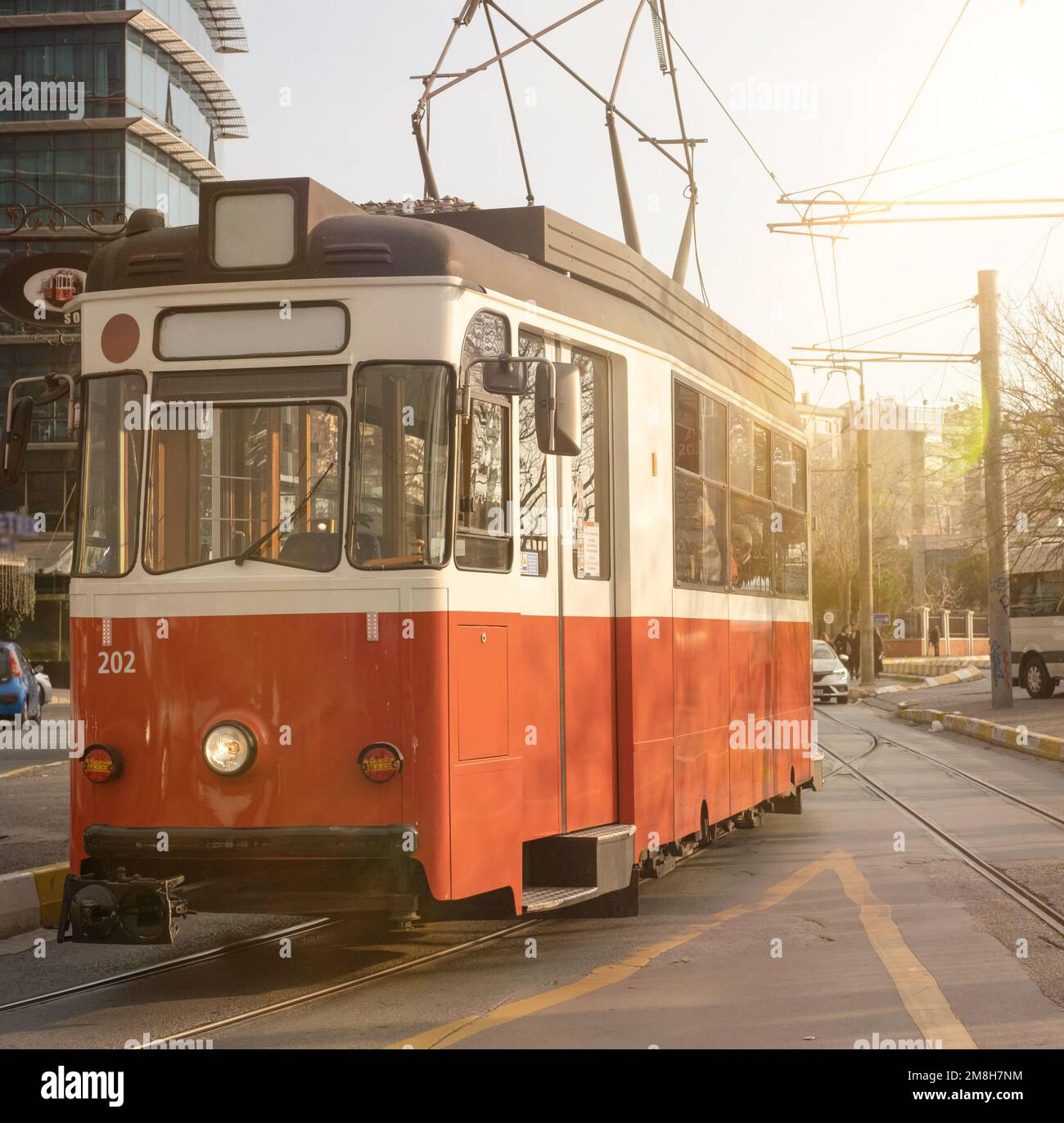 Retro Tram Or Tramway. Retro Tram Stopped At a Stop And Sunlight Stock Photo