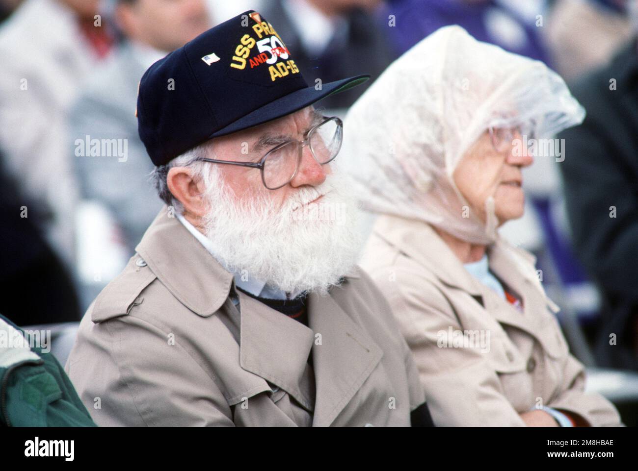 Retired Rear Adm. John Higginson, USN listens to a speaker during the decommissioning ceremony for the destroyer tender USS PRAIRIE (AD-15). Following the ceremony, the submarine tender USS ORION (AS-18) will assume the PRAIRIE's role of the oldest ship in naval service. Base: Naval Air Station, Long Beach State: California (CA) Country: United States Of America (USA) Stock Photo