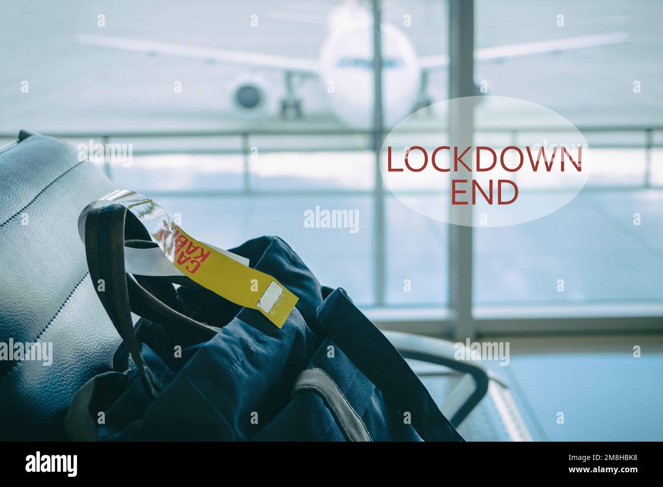 Ready to travel, lockdown end. Sign at the airport Checkin baggage on the chair in waiting