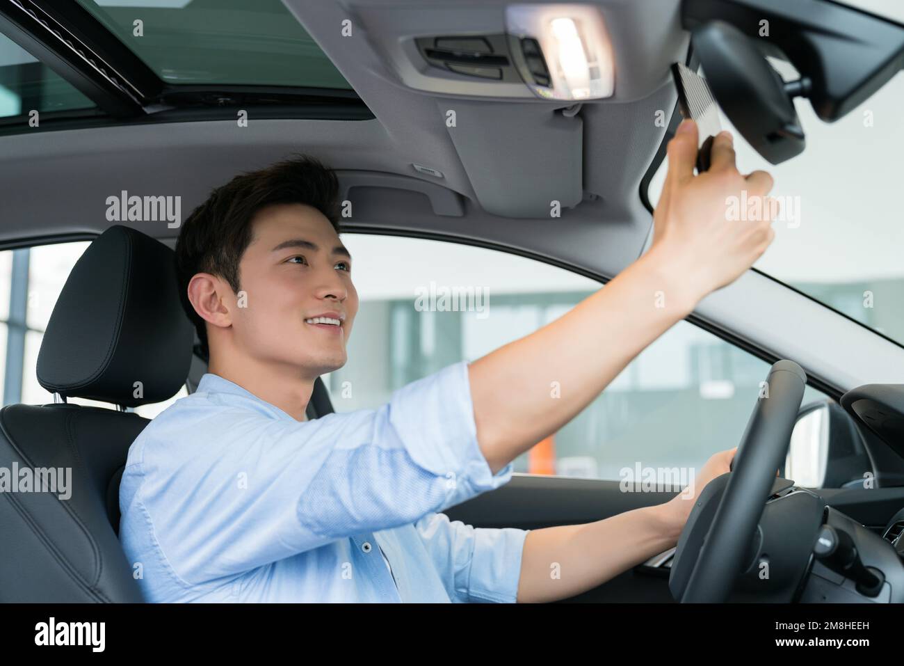 A young business man in the car Stock Photo - Alamy