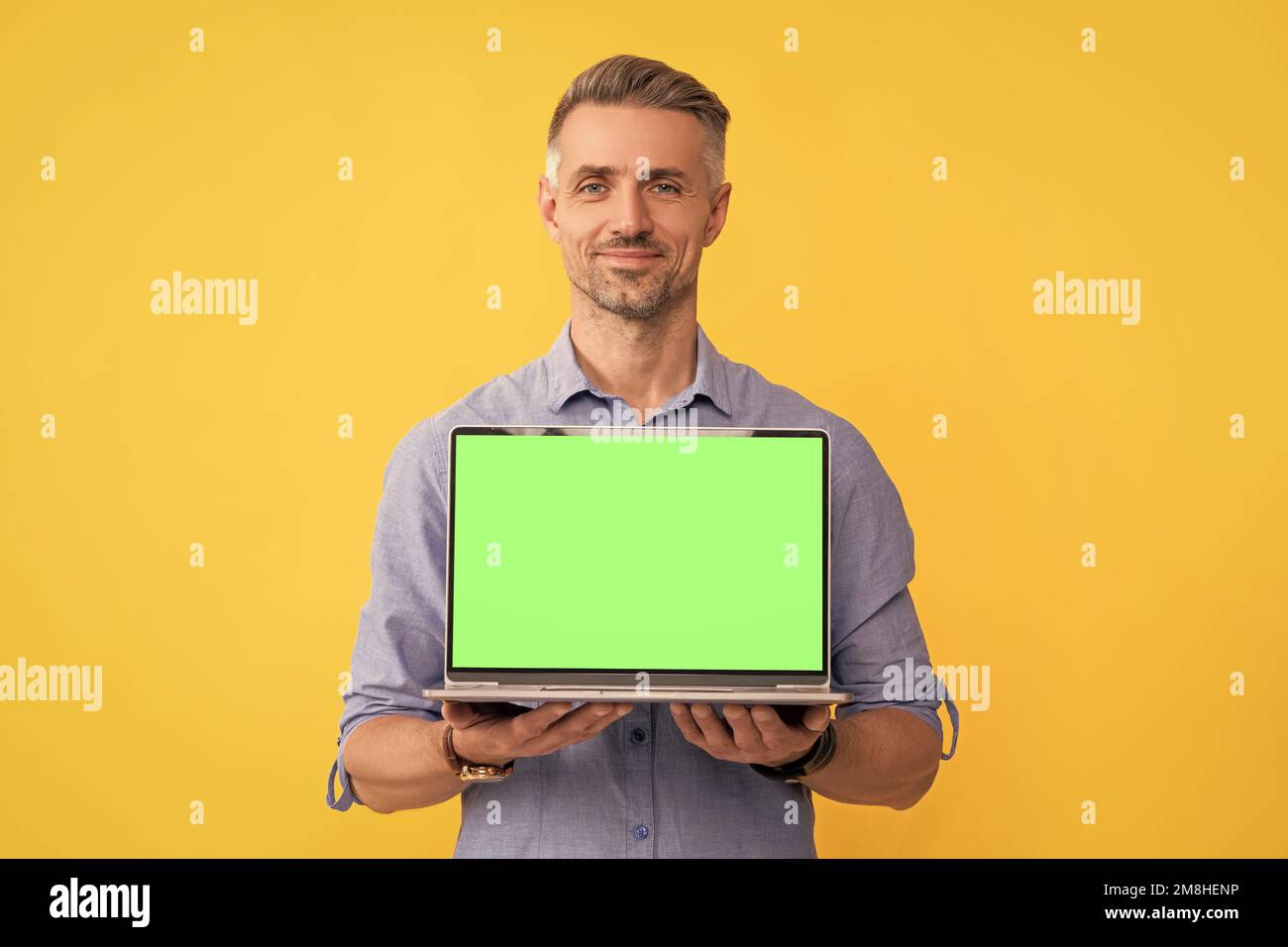 smiling businessman presenting product. presentation on computer. office manager Stock Photo