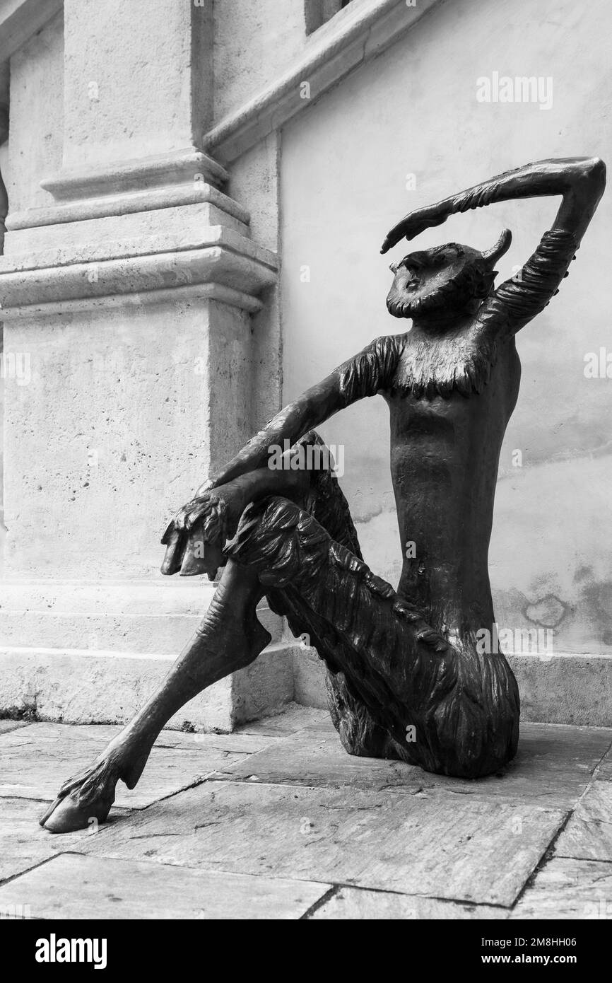 A bronze faun, a rampant lion in the beautiful renaissance courtyard of the the Landhaushof on Herrengasse in Graz, Austria Stock Photo