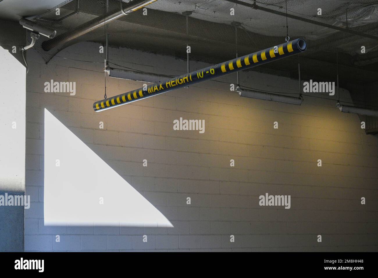 Height check bar for vehicles maximum height notice to enter the garage Stock Photo