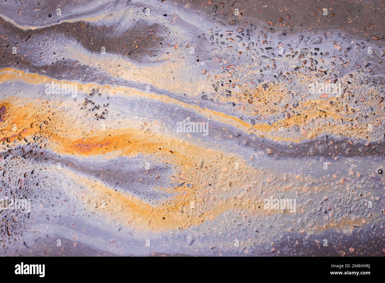 Abstract Oil on Tarmac Rainbow Colours Stock Photo - Alamy