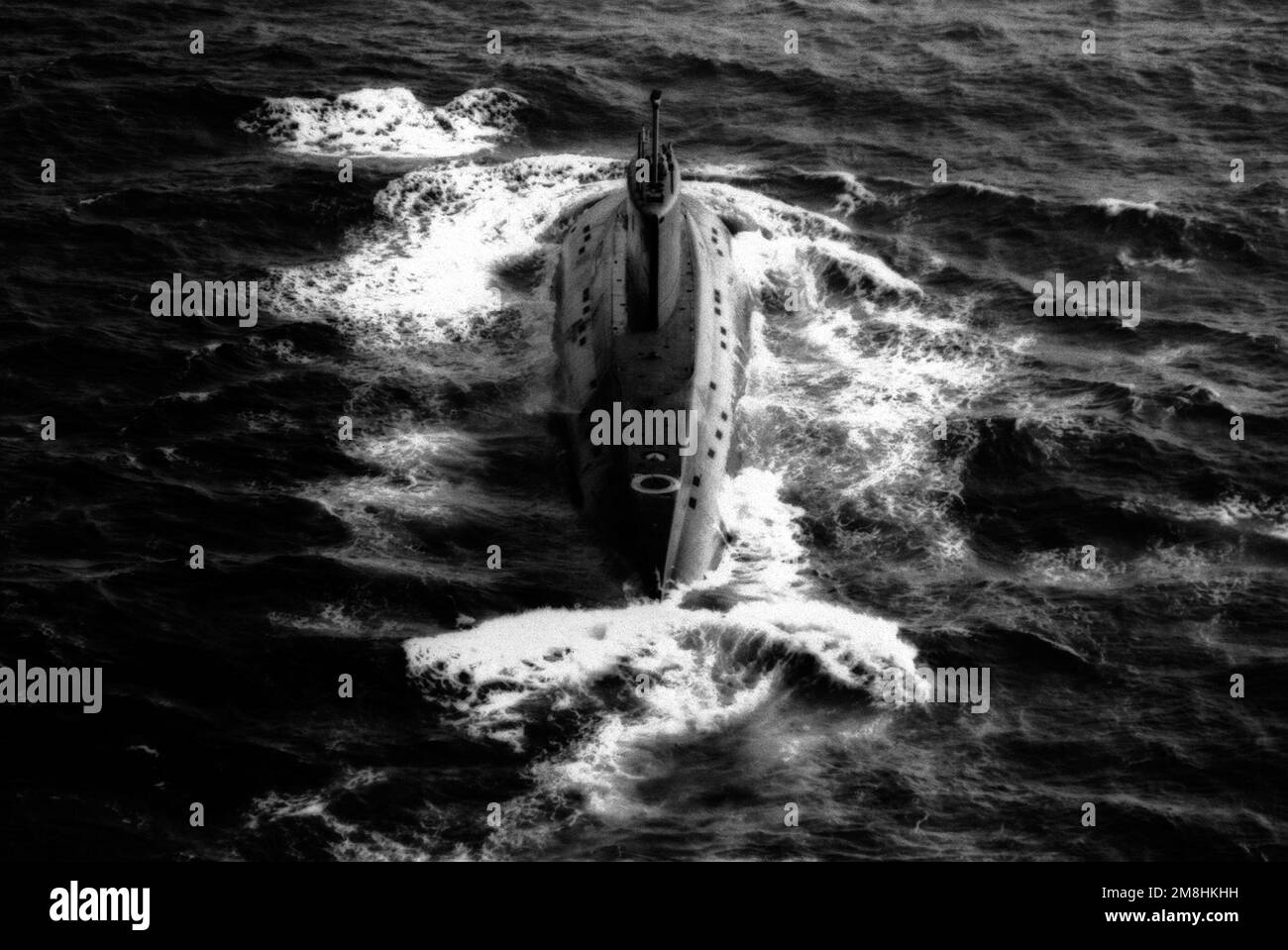 Stern-on view of Iran's second KILO class diesel-powered submarine underway en route from the Baltic to Iranian home waters. The submarine was photographed by Light Helicopter Squadron 48 (HSL-48) from the USS SPRUANCE (DD-963). Country: Unknown Stock Photo
