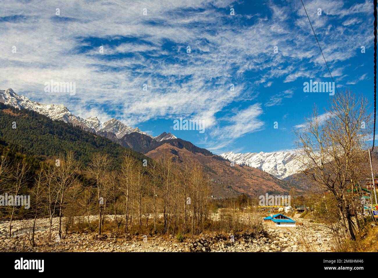 Colours of Manali in Himachal Pradesh India. Panoramic views of Himalayas. Rainbow Waterfall of Jogni waterfall trek in Manali Himachal Pradesh, India Stock Photo