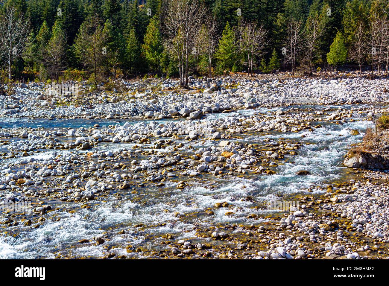 Colours of Manali in Himachal Pradesh India. Panoramic views of Himalayas. Rainbow Waterfall of Jogni waterfall trek in Manali Himachal Pradesh, India Stock Photo