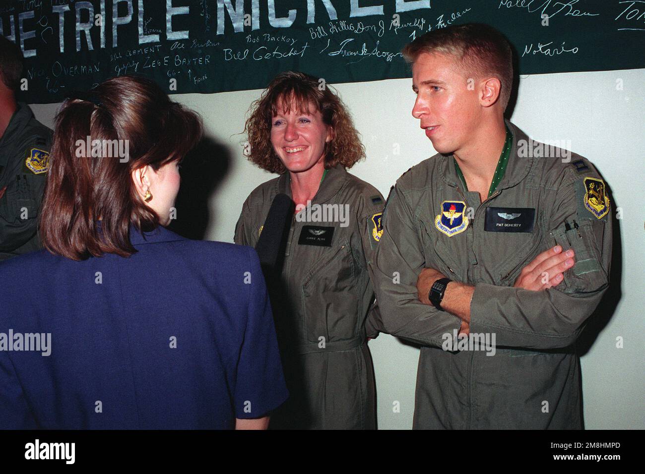 1ST LT. Jeannie Flynn responds to questions from a reporter as ...