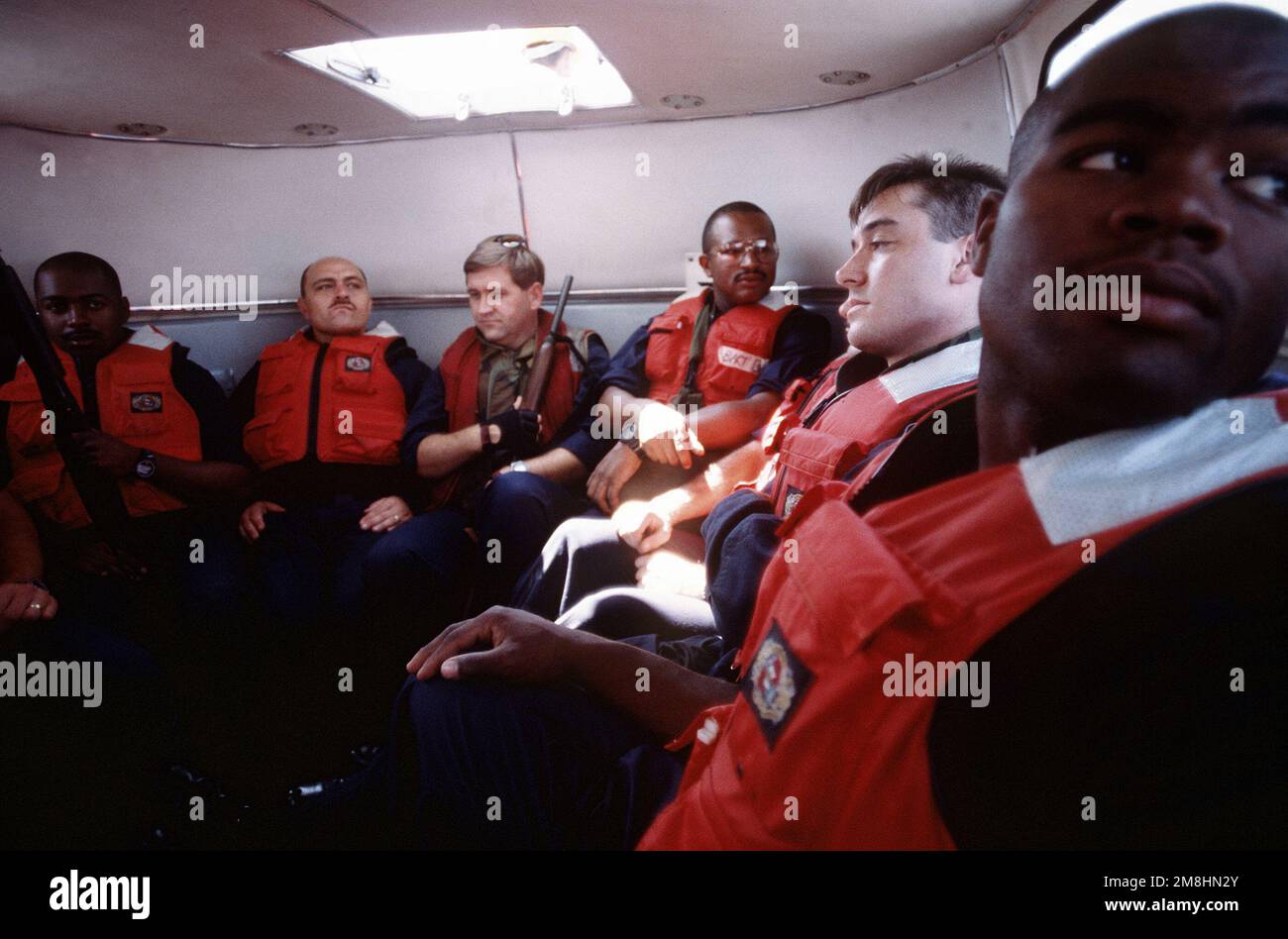 Sailors from the guided missile cruiser uss normandy cg 60 making up