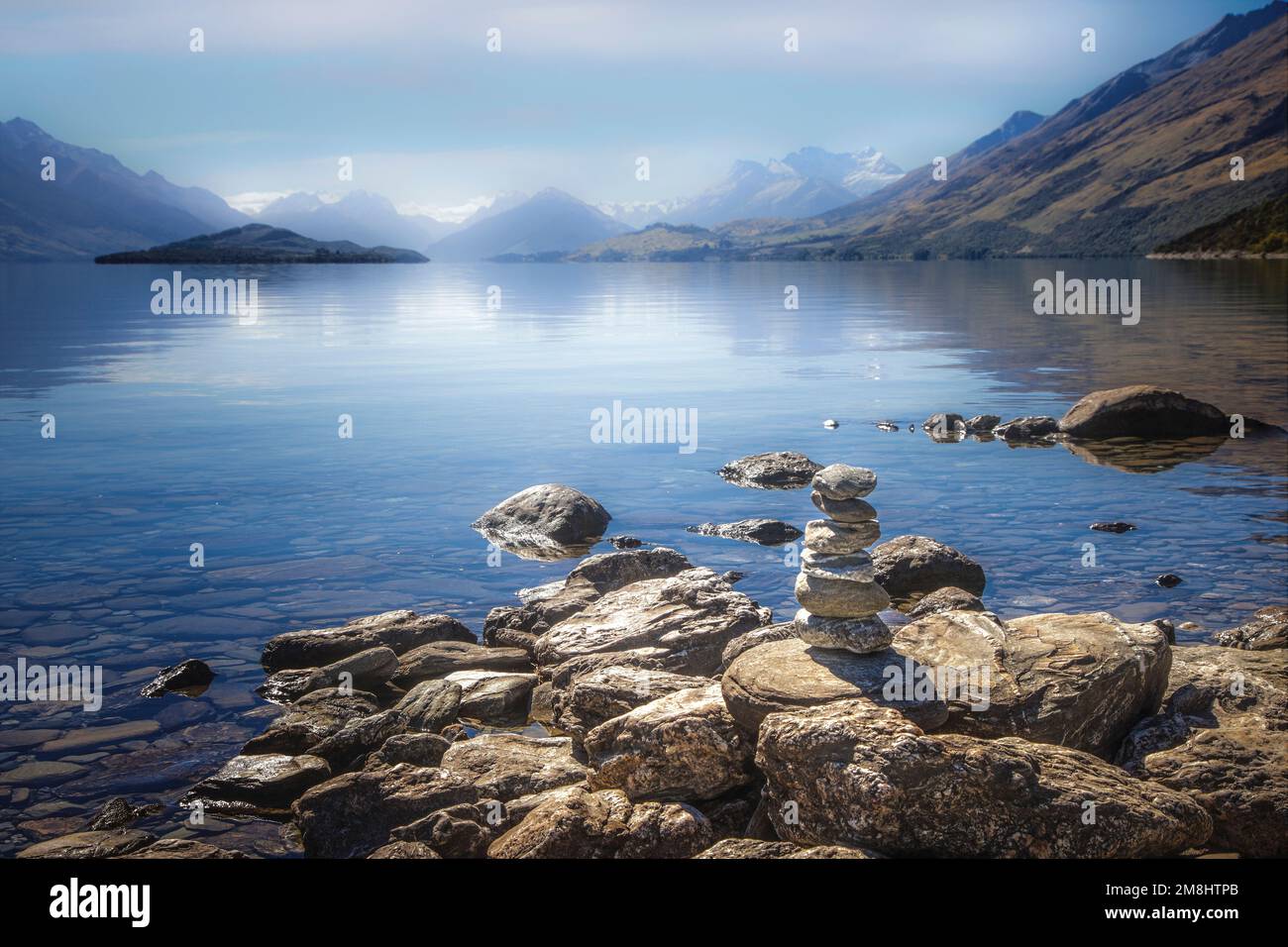 Lake Wakatipu extends to Mt. Aspiring National Park on the South Island of New Zealand. Stock Photo