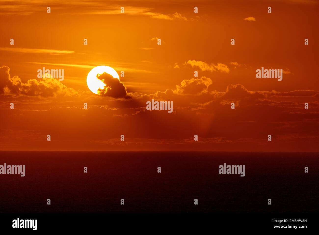 Sunset over the Irish Sea from South Stack, Anglesey, North Wales Stock Photo