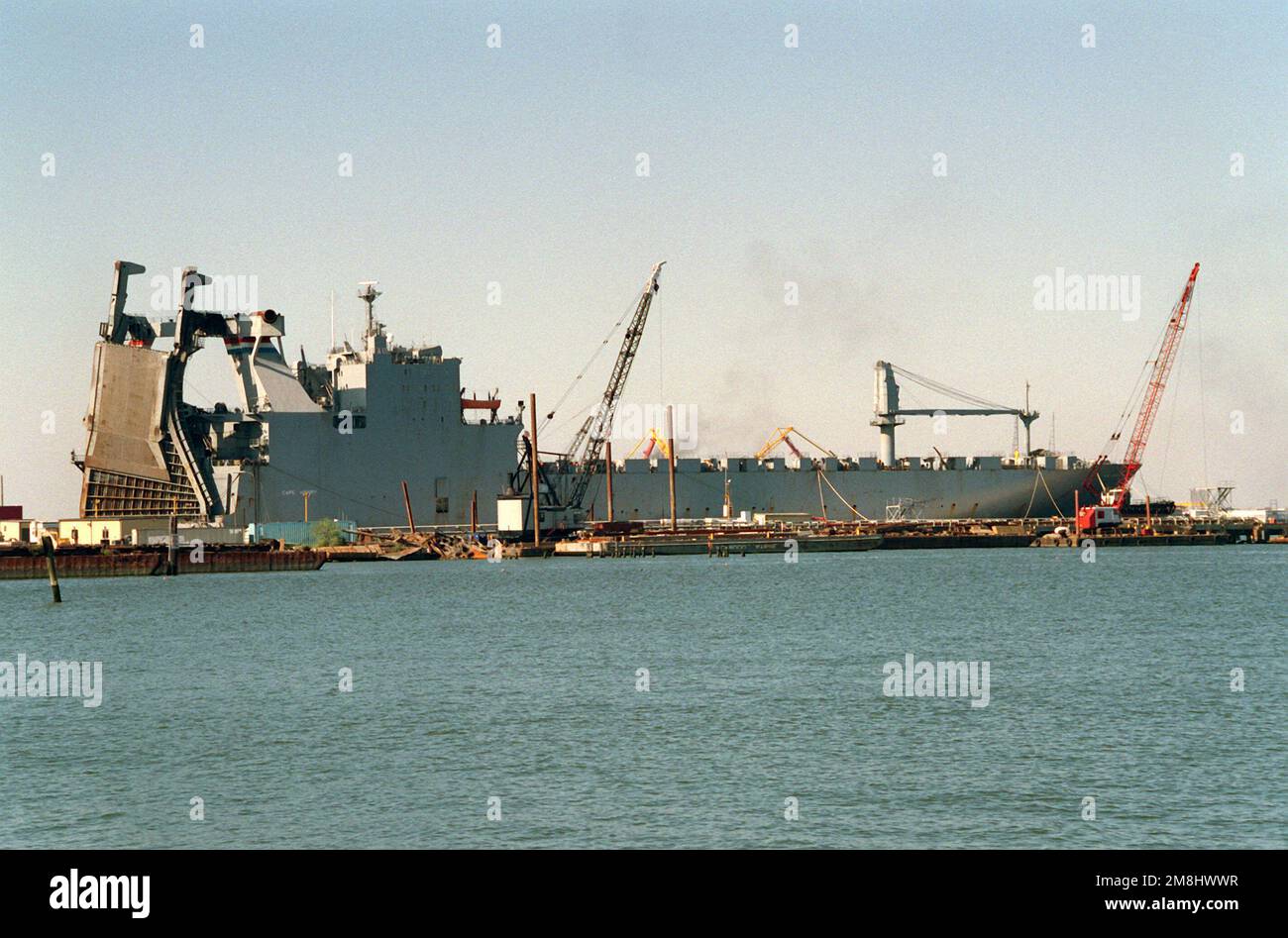 A starboard quarter view of the Military Sealift Command chartered roll-on/roll-off vehicle cargo ship CAPE HENRY (T-AKR-5067) moored at the Moon Engineering Corporation facility on the Elizabeth River. Base: Norfolk State: Virginia (VA) Country: United States Of America (USA) Stock Photo