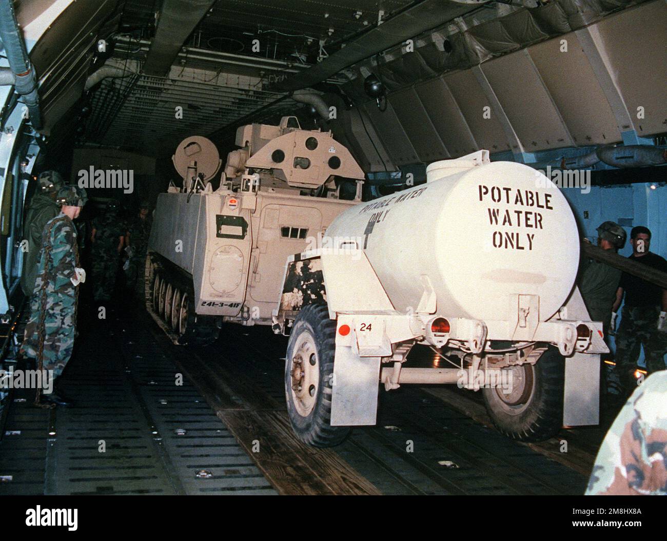 3rd Battalion 41st Field Artillery, 24th Infantry Division, loading an