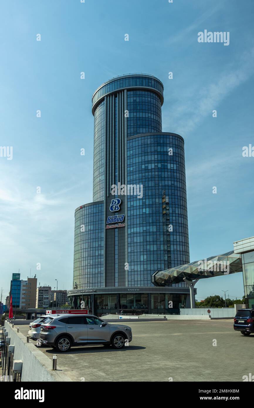 Chelyabinsk, Russia - July 24, 2022. The high-rise building of the Business Hall against the sky. The inscription on the wall of the building: Busines Stock Photo