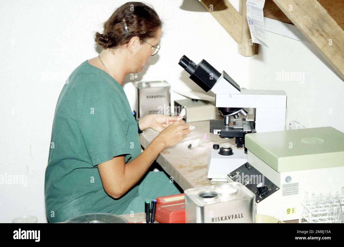 2nd LT. Gun Savhammar, 46th Combat Support Hospital, performs lab work ...