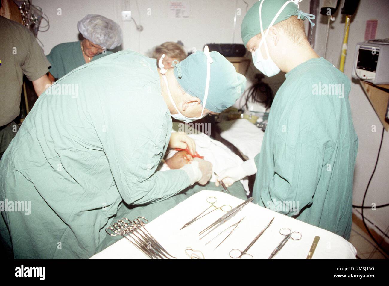 Medical instruments are displayed on the table as Dr. (LT. COL ...