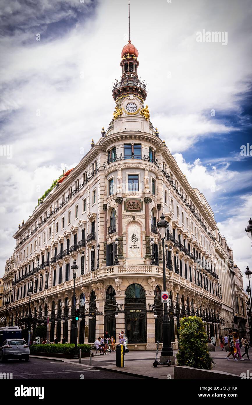 Madrid, Spain - June 20, 2022: Four Seasons Hotel building with Hermes shop on the first floor Stock Photo
