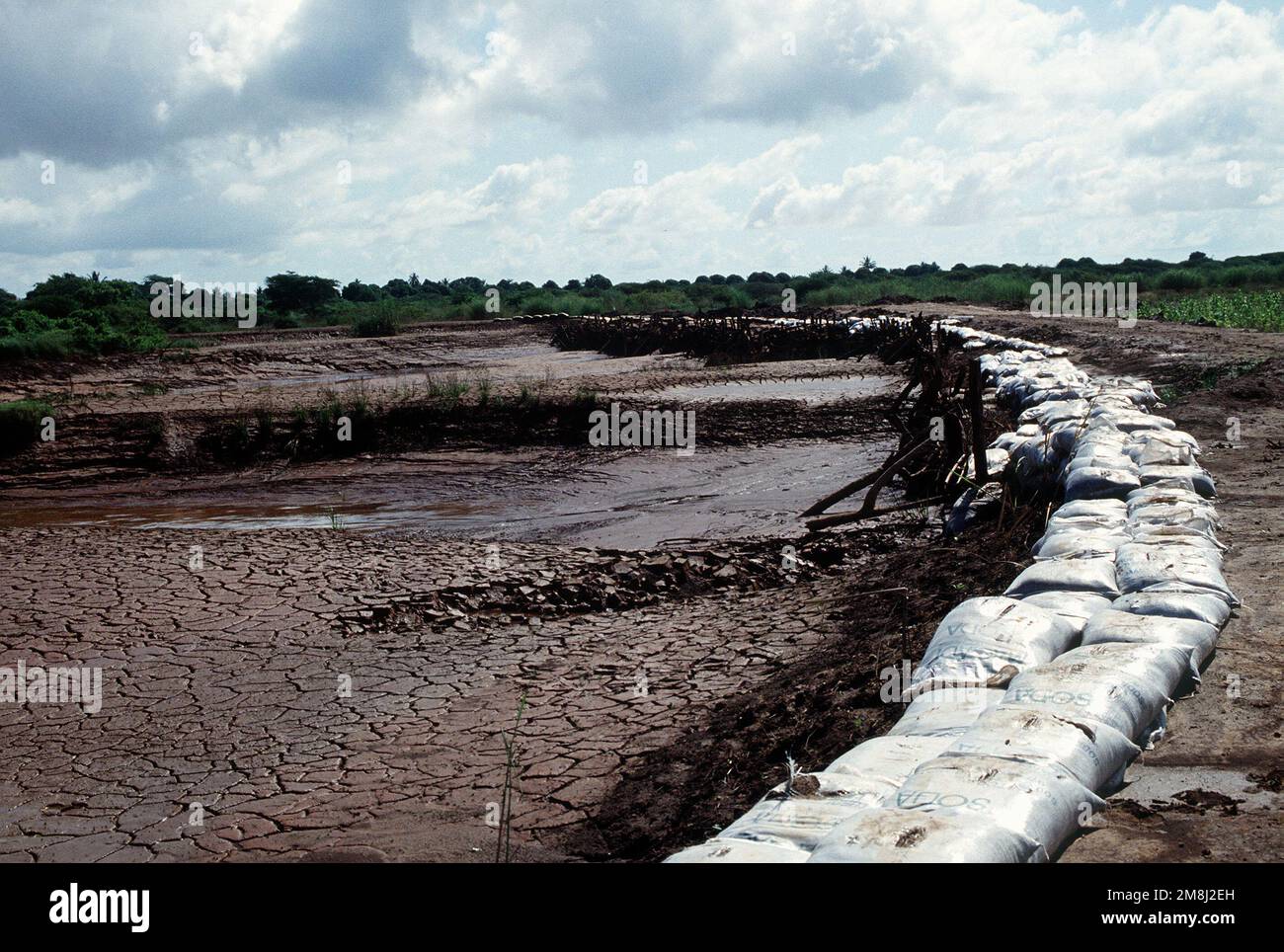 A dam built by the Belgian contingent to control flood waters in Kismayo. The Belgians are part of the United Nations forces in Somalia in support of OPERATION CONTINUE HOPE. Subject Operation/Series: CONTINUE HOPE Base: Kismayo Country: Somalia (SOM) Stock Photo
