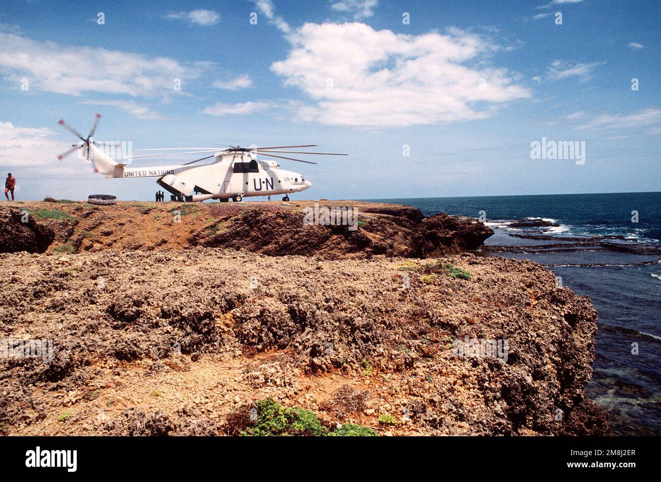 A Russian made Mi-26 Halo helicopter on the shores of Kismayo, Somalia. The Mi-26 Halo is used to shuttle supplies and personnel to areas outside Mogadishu during Operation CONTINUE HOPE. Subject Operation/Series: CONTINUE HOPE Base: Kismayo Country: Somalia (SOM) Stock Photo