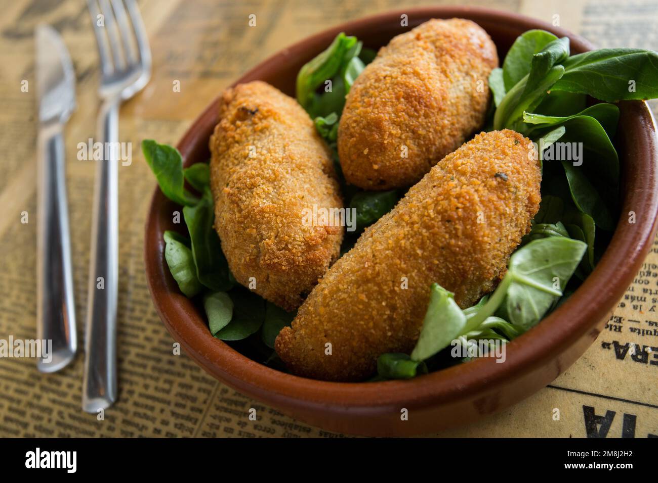 Spanish croquettes. The croquette is a portion of dough made from a