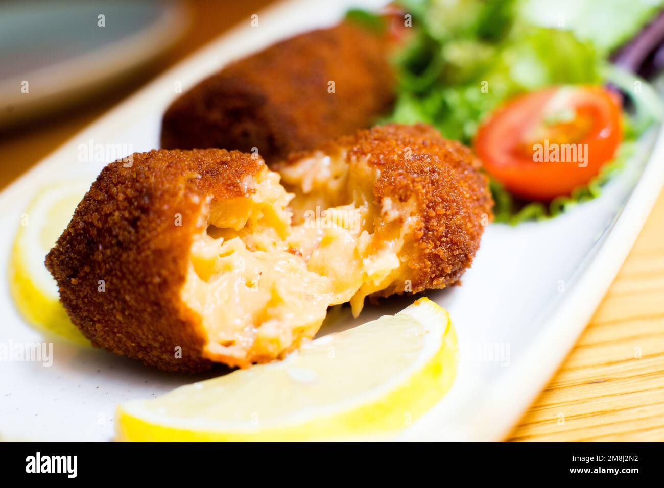 Spanish croquettes. The croquette is a portion of dough made from a
