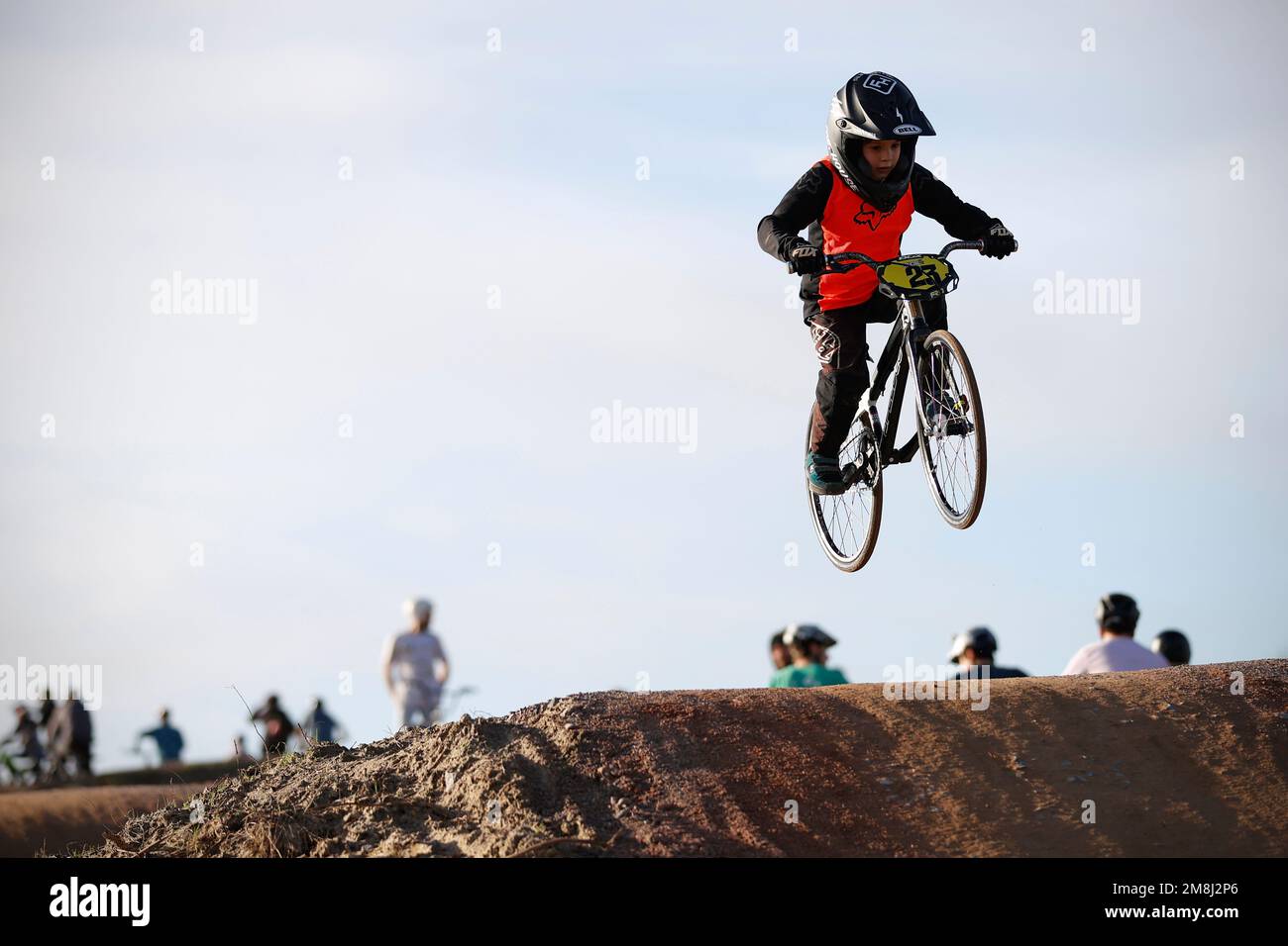 Mountain bike riders in action at a BMX and pump track near Fleet in Hampshire Stock Photo Alamy