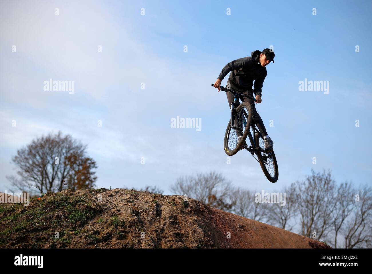 Mountain bike riders in action at a BMX and pump track near Fleet in