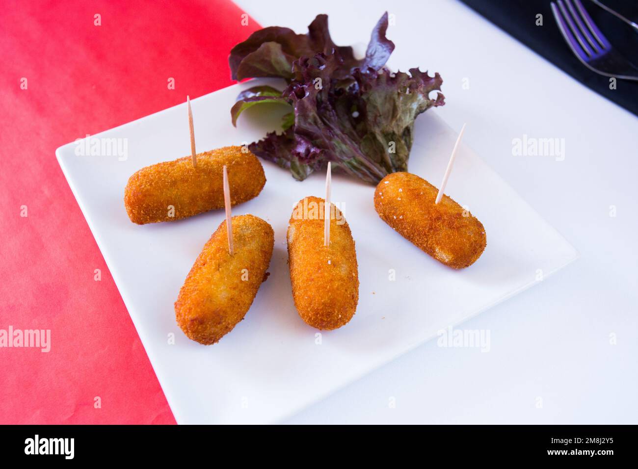 Spanish croquettes. The croquette is a portion of dough made from a