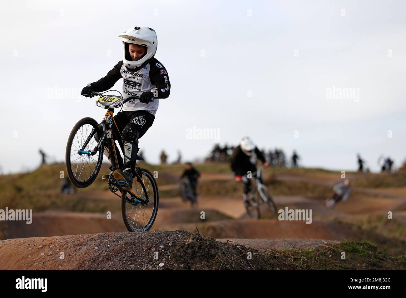 Mountain bike riders in action at a BMX and pump track near Fleet in Hampshire Stock Photo Alamy