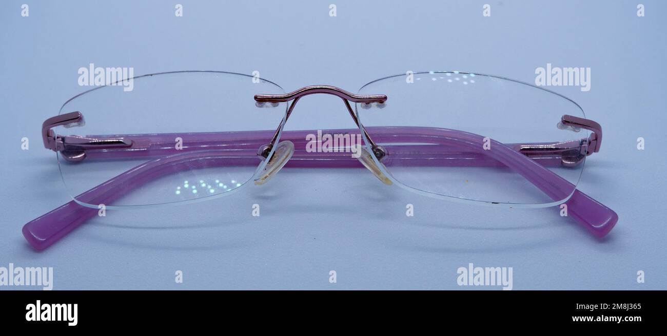 rimless glass spectacle transparent in nature lightweight Stock Photo