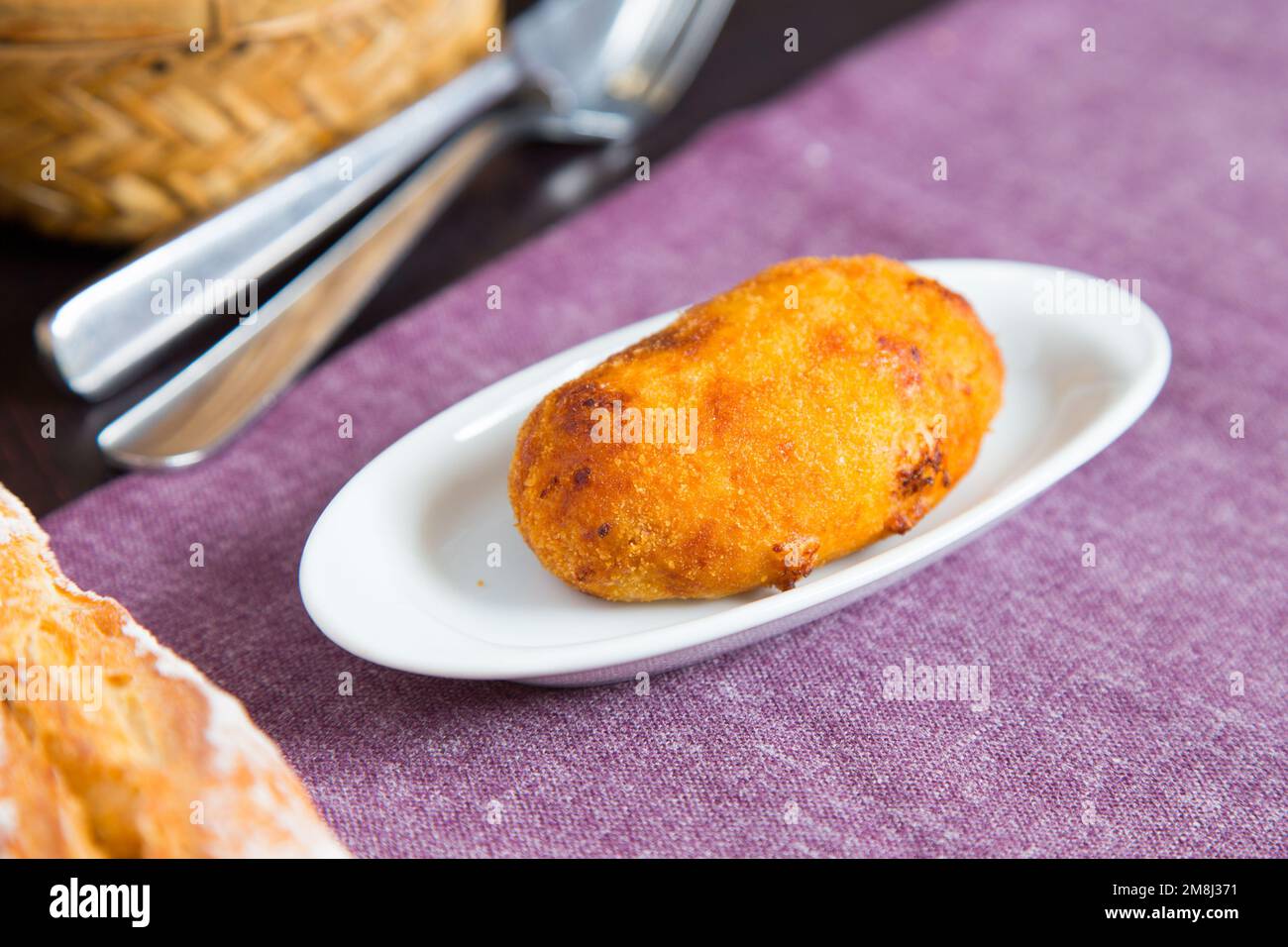 Spanish croquettes. The croquette is a portion of dough made from a