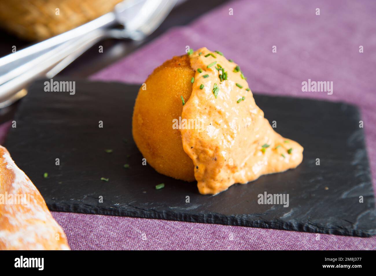 Spanish croquettes. The croquette is a portion of dough made from a