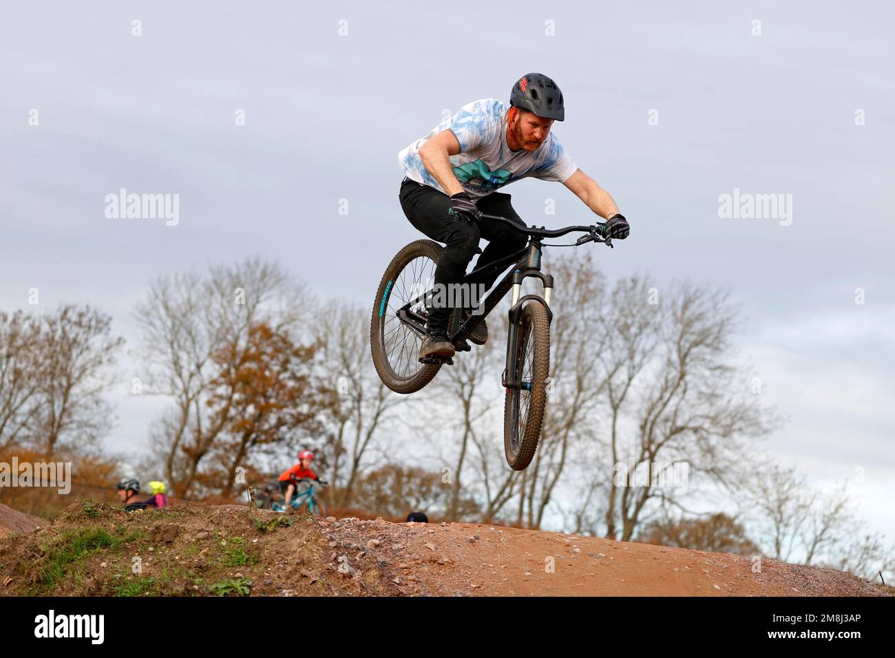 Mountain bike riders in action at a BMX and pump track near Fleet in