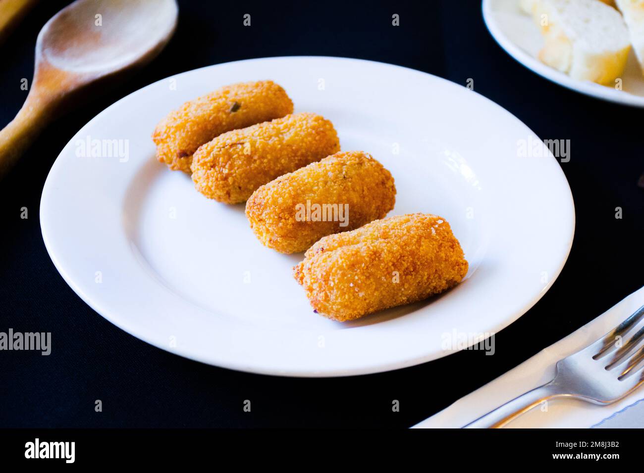 Spanish croquettes. The croquette is a portion of dough made from a