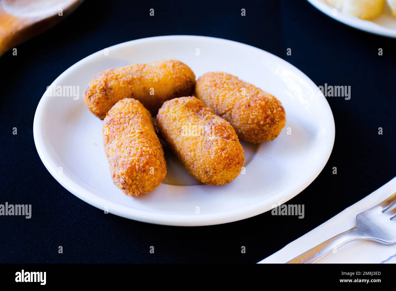 Spanish croquettes. The croquette is a portion of dough made from a