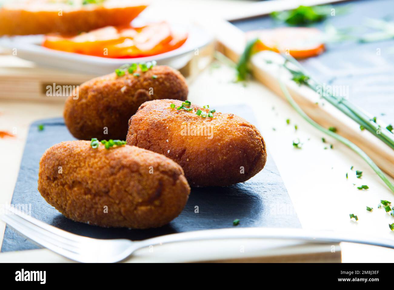Spanish croquettes. The croquette is a portion of dough made from a