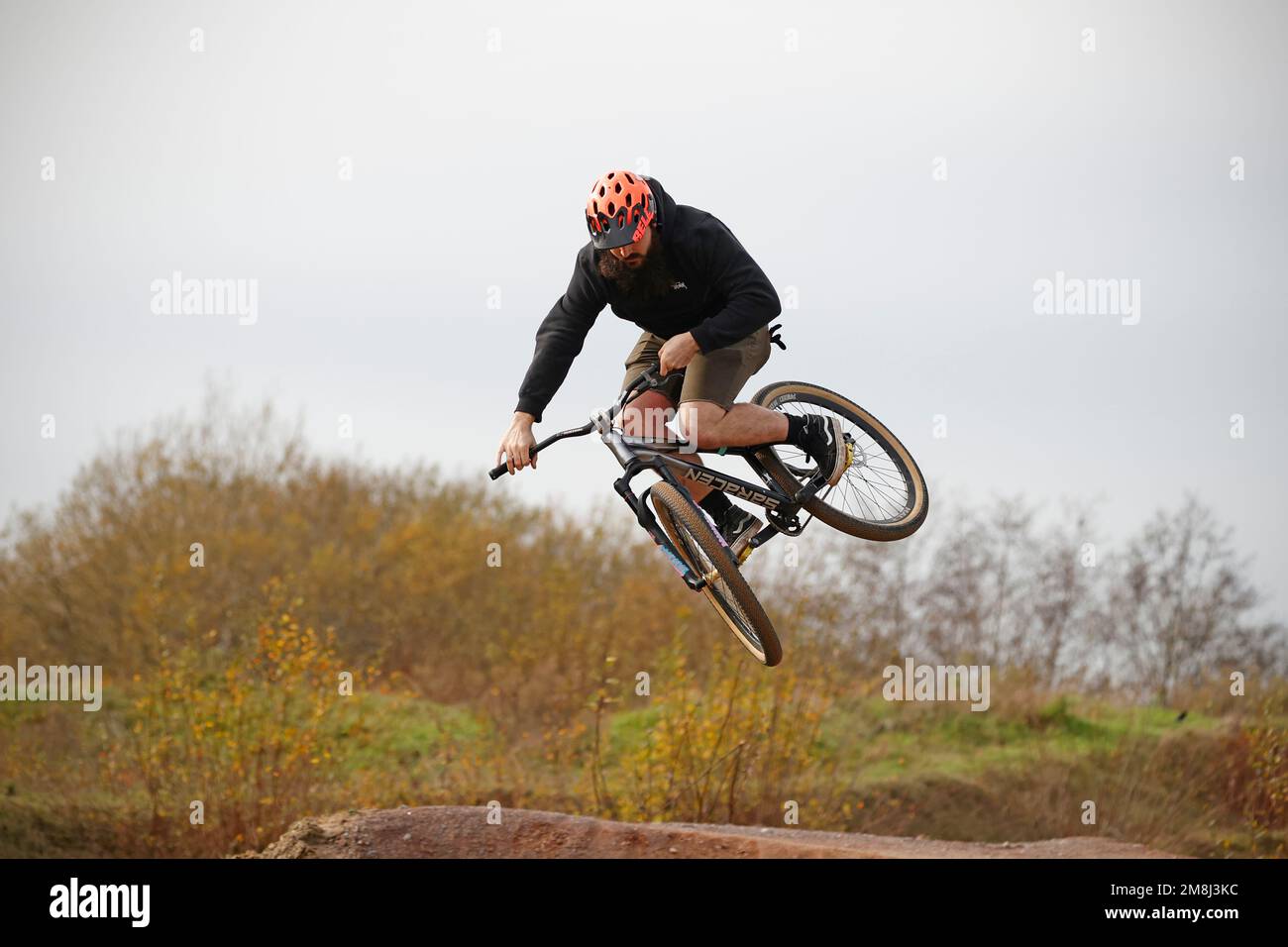 Mountain bike riders in action at a BMX and pump track near Fleet in Hampshire Stock Photo Alamy