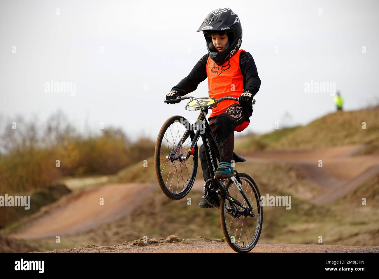 Mountain bike riders in action at a BMX and pump track near Fleet in Hampshire Stock Photo Alamy