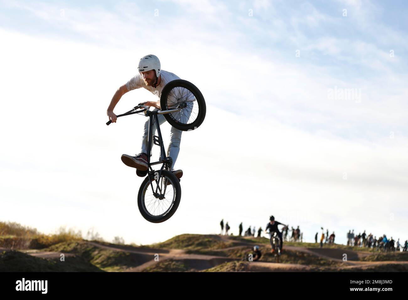 Mountain bike riders in action at a BMX and pump track near Fleet in Hampshire Stock Photo Alamy